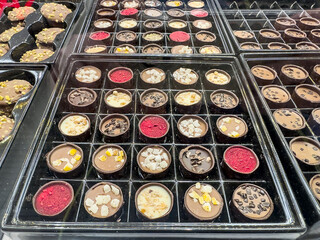 Sweet  hand-made chocolate candies in candy shop