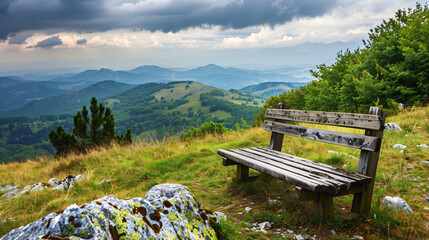 Old bench stands on top of the mountain