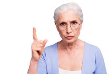 Portrait of grey haired old strict woman wearing glasses pointing up threatening with finger. Isolated over violet purple background