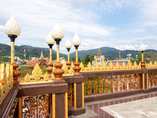 Observation platform at the top of Wat Chalong buddhist temple pagoda offering panoramic views - Phuket, Thailand