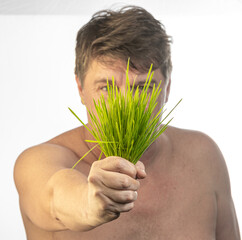 man holding a plant