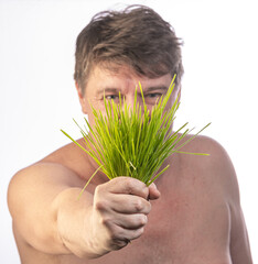 man holding a plant