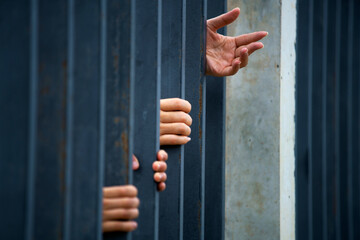 hands in jail