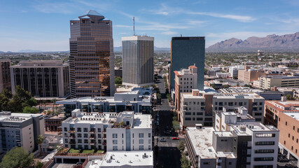 Tucson, Arizona, USA - May 28, 2022: Afternoon sun shines on the urban core of downtown Tucson. - obrazy, fototapety, plakaty