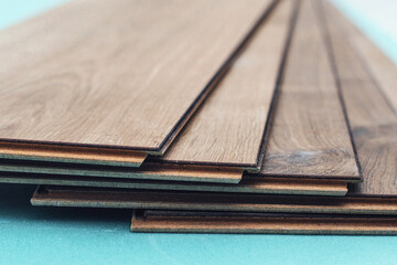 Laminate with a pattern and wood texture for flooring and interior design. Installing laminate flooring.