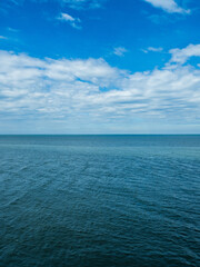 Landscape beautiful summer vertical horizon look view tropical shore open sea beach cloud clean and blue sky background calm nature ocean wave water nobody travel at  thailand chonburi sun day time