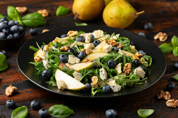 Pear Gorgonzola cheese, blueberries and Walnut Salad. Healthy food