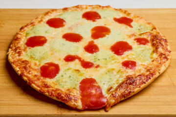 pizza cooked on a wooden board