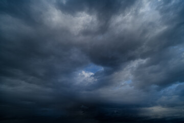 storm sky, dark dramatic clouds during thunderstorm, rain and wind, extreme weather, abstract...