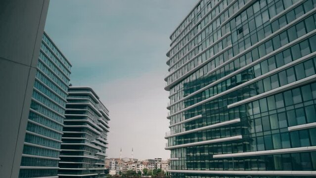 Time lapse of a generic modern business centre and distant historic mosque in Istanbul, Turkey