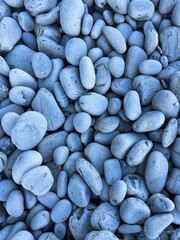 Beach made of stones, sea pebbles, close-up view. Natural backgrounds