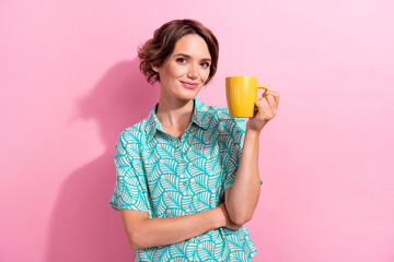 Photo of stunning peaceful person arm hold fresh aroma coffee mug enjoy free time isolated on pink color background