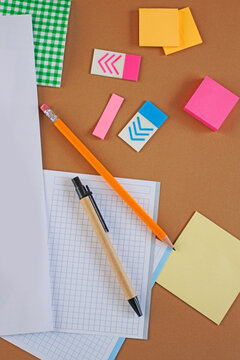 Organized office supplies on a brown background