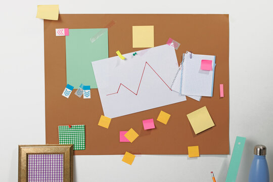 Creative corkboard with stationery and organization concept