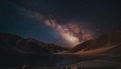 Papier Peint photo Himalaya Milky Way galaxy stretches over Pangong Tso Lake in Ladakh, India