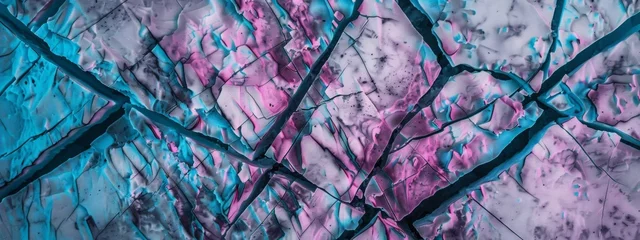 Zelfklevend Fotobehang abstract pattern that resembles ariel view of cracked ice, cracks have teal and magenta colors © paisorn