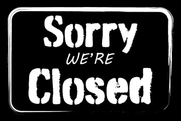 Sorry we are closed sign. Text on black background