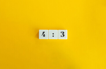 4:3 Aspect Ratio. Text on Block Letter Tiles on Flat Background. Minimalist Aesthetics.