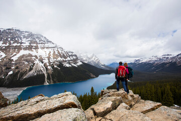 Young couple in Peyto lake, Banff National Park, Canada