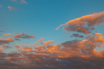 Partly cloudy sky at sunset or sunrise background or backdrop photo