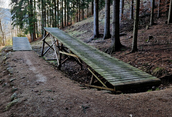 jumps and the construction of benches for jumps and terrains of dirt inclined paths in the former...