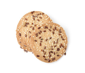 Round cereal crackers with flax, sunflower and sesame seeds isolated on white, top view