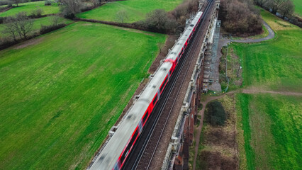 Views above Ouse Valley Viaduct from a drone, train going past Ouse Valley Viaduct 