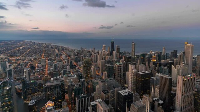 Time lapse aerial view day to night of Chicago skyline