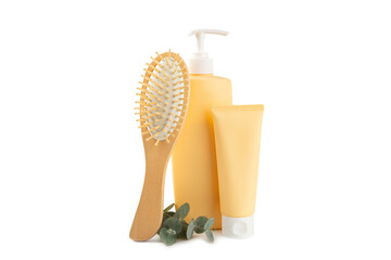 Bottle of shampoo and hair mask with eucalyptus extract isolated on a white background. Towel and hair comb. Natural cosmetic product. Hair and scalp care. Beauty concept.