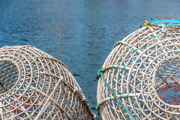 Two big wicker fishing baskets on the fishermen's bench in the port of Mar del Plata, Argentina.