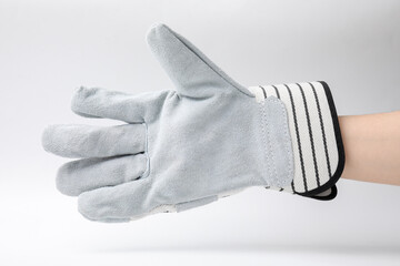 Woman in gardening glove on white background, closeup