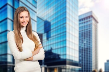 Studio shot of smiling woman posing on background