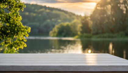 Empty wooden table top with blurred nature background. Calm sunny evening in nature with view to lake, river water and forest, park trees. Table top with copy space for product advertising  - obrazy, fototapety, plakaty
