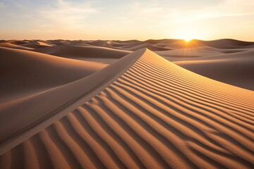 Sand patterns formed by wind on a desert dune during golden hour