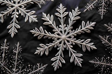 Perfect snowflake on dark wool fabric
