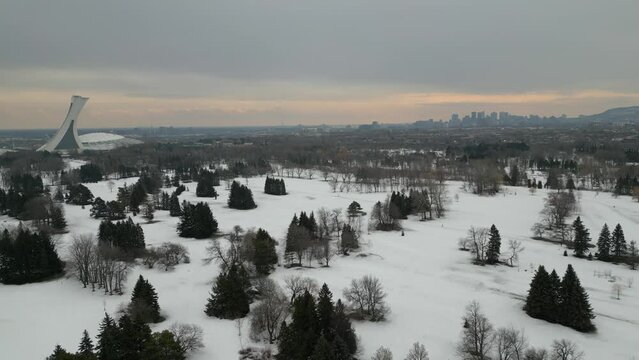 Montreal Winter Drone with Olympic Stadium and Skyline over Parc Maisonneuve