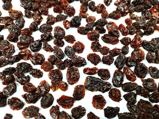 Background with dried raisins. Very common ingredient in  end of year parties recipes.