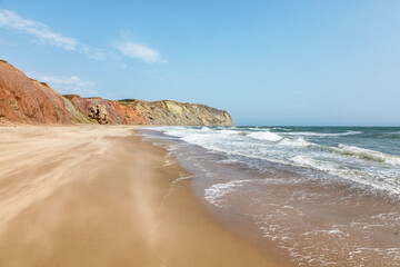 Deserted beach in Havre Aux Maison, Magdalen Islands, Canada. The islands are known for the red stone cliffs and sandy beaches in the Gulf of St Lawrence - 750676415