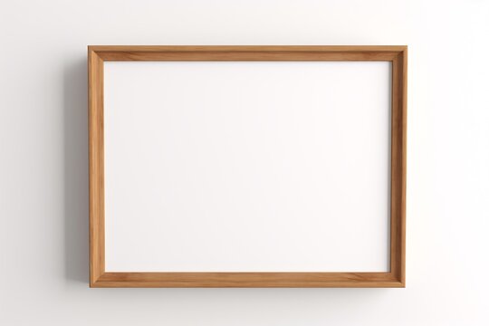 a wooden frame on a white wall