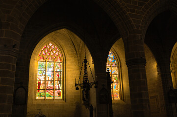 Fototapeta premium Tained window and interior of medieval gothic church of Vitre, Bretagne, France