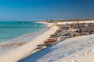 Panorama of Mamirano bay taken from a white dune. At the foot of the dune a Vezo village. Tulear, Madagascar