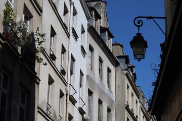 typical facade from Paris , real estate and residential building