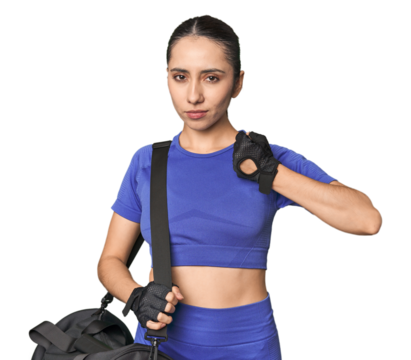 Young Caucasian athlete with gym bag