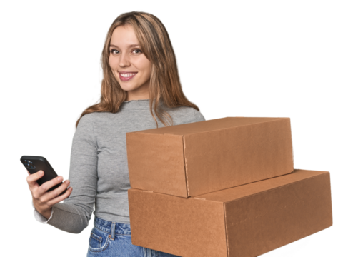 Caucasian blonde with boxes and phone, coordinating move with an app .