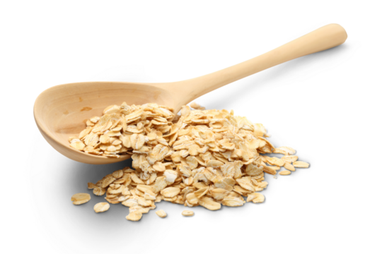 Heap of rolled oats with wooden spoon