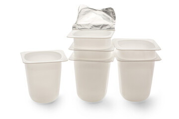 Empty plastic yogurt pots