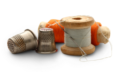 Sewing thimbles, bobbins and needle