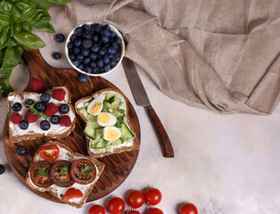 assorted sandwiches with different fillings for breakfast