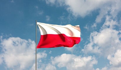 Naklejka na ściany i meble Flag Poland. against cloudy sky. Country, nation, union, banner, government, Polsish culture, politics. 3D illustration