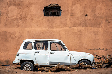 Abandoned old car in the historic village of Mhamid, Morocco - 750700819